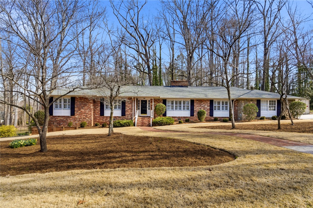 106 Cherokee Circle Anderson, SC 29621 - Photo 1 of 47 This classic brick residence features a welcoming entrance and well-maintained landscaping.