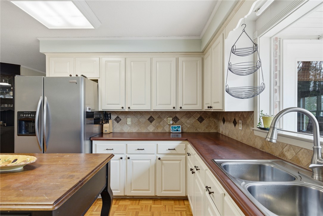 106 Cherokee Circle Anderson, SC 29621 - Photo 15 of 47 This spacious kitchen offers ample storage and a bright, inviting atmosphere for culinary pursuits.