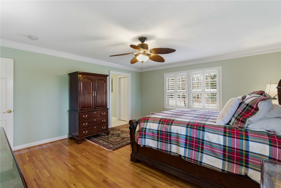 106 Cherokee Circle Anderson, SC 29621 - Photo 26 of 47 This tranquil bedroom offers hardwood flooring and bright window features for comfortable living.