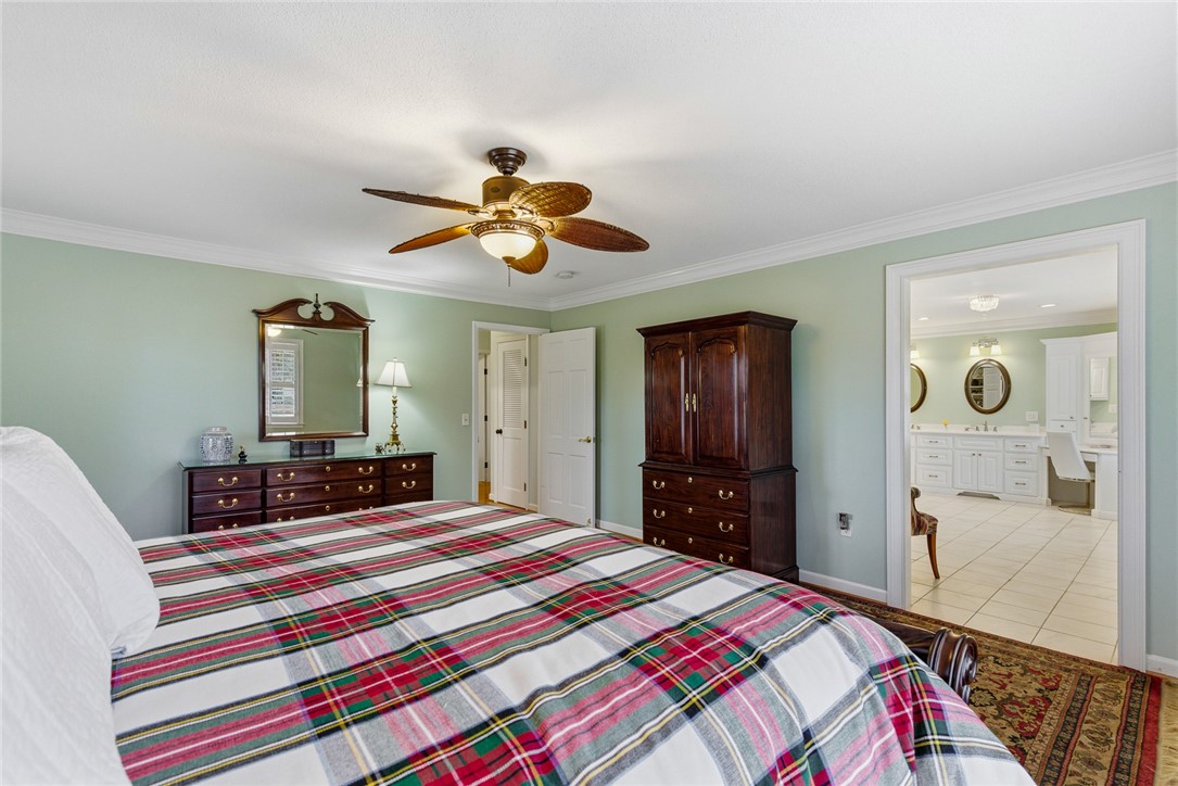 106 Cherokee Circle Anderson, SC 29621 - Photo 27 of 47 This spacious bedroom offers a tranquil retreat with convenient access to an adjoining bathroom.