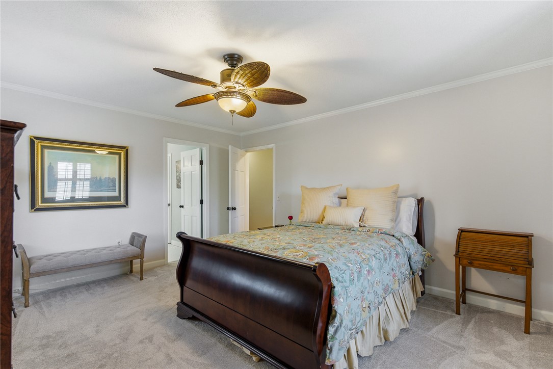 106 Cherokee Circle Anderson, SC 29621 - Photo 33 of 47 This inviting bedroom features soft carpeting and ample natural light, offering a tranquil personal retreat.