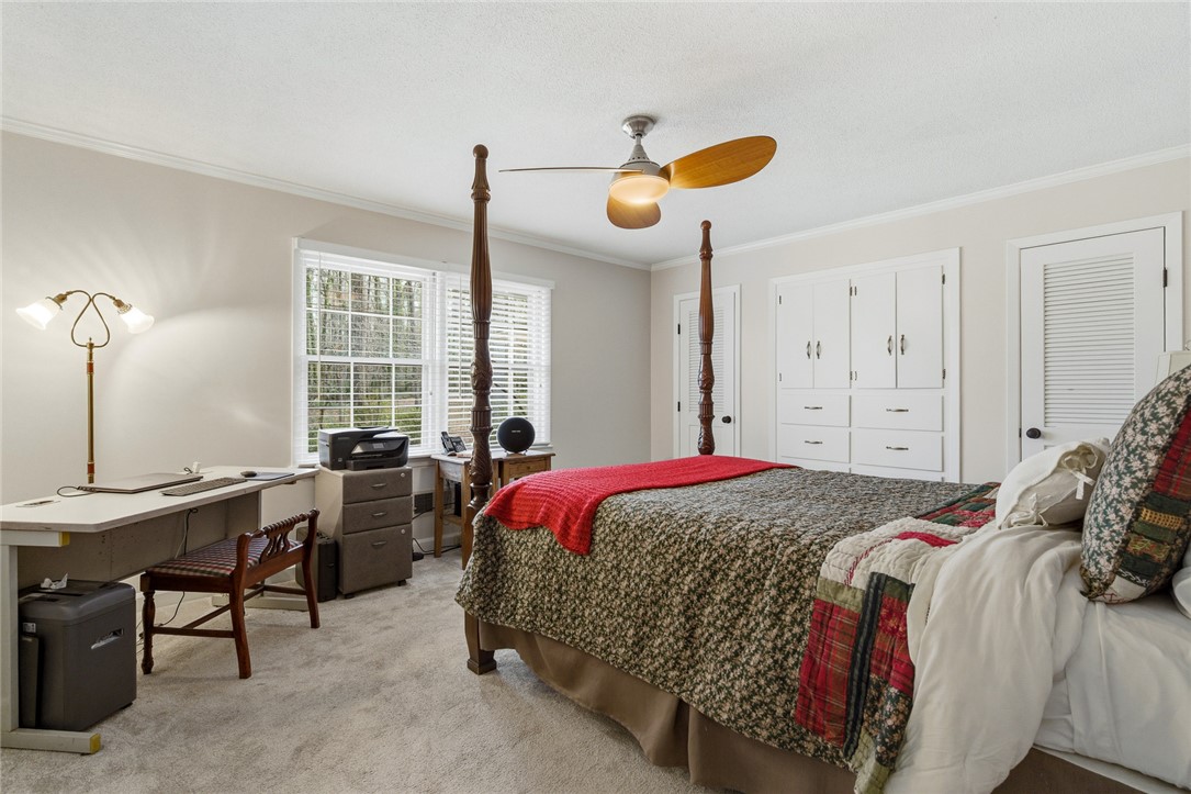 106 Cherokee Circle Anderson, SC 29621 - Photo 35 of 47 This spacious bedroom offers ample natural light and comfortable living.
