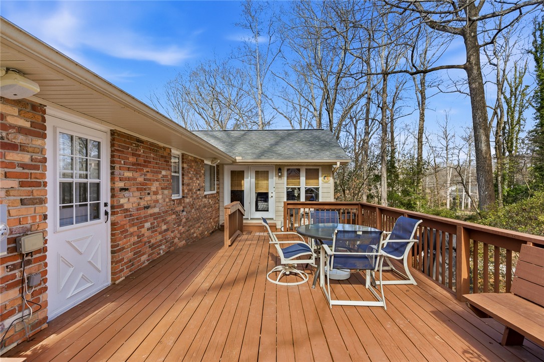 106 Cherokee Circle Anderson, SC 29621 - Photo 42 of 47 This spacious wooden deck offers an ideal setting for outdoor enjoyment.