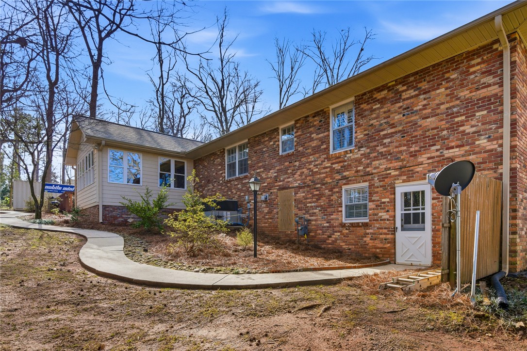 106 Cherokee Circle Anderson, SC 29621 - Photo 45 of 47 This residence features a timeless brick exterior with well-maintained grounds, offering classic charm and comfort.