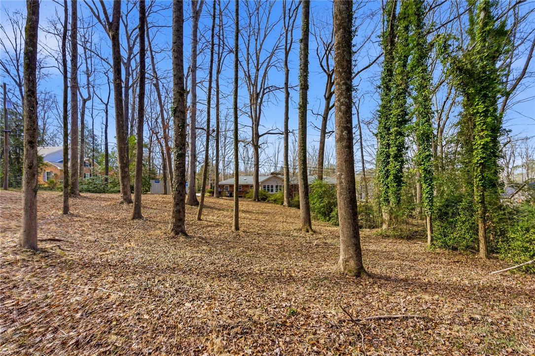 106 Cherokee Circle Anderson, SC 29621 - Photo 47 of 47 Mature trees and foliage envelop this wooded lot, offering seclusion and natural beauty.