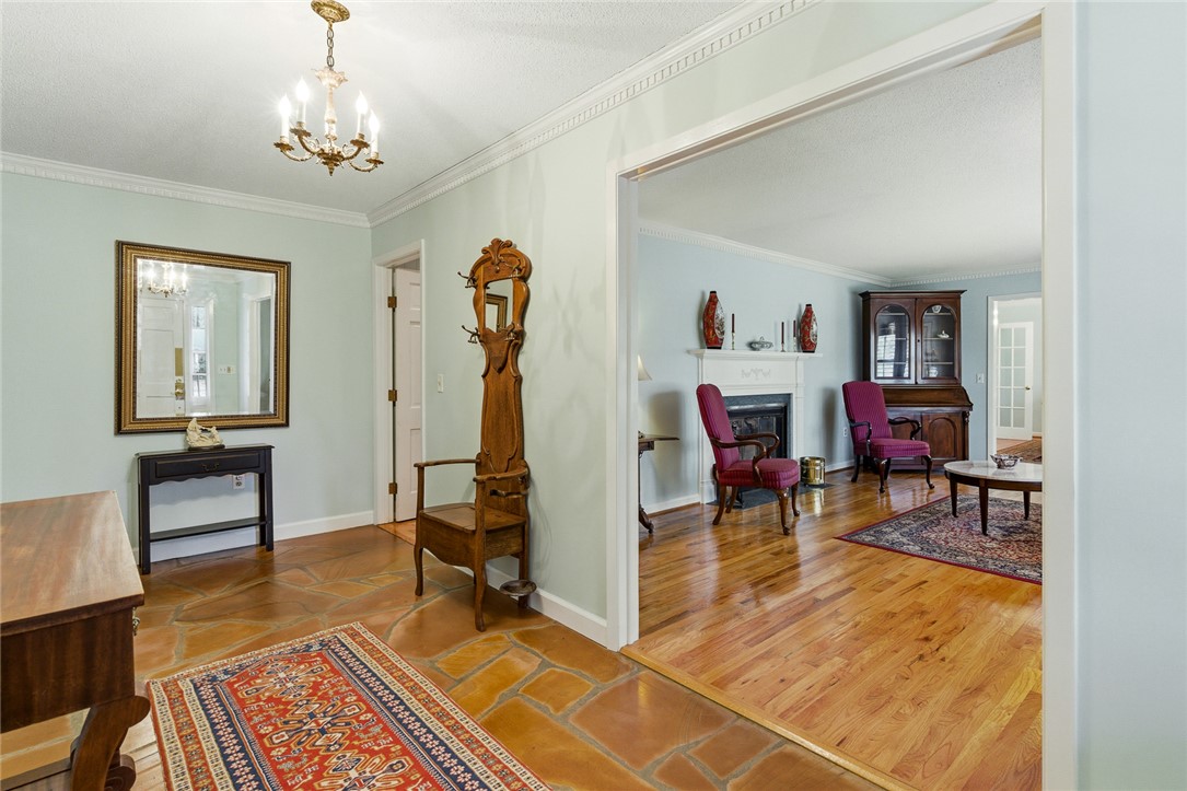 106 Cherokee Circle Anderson, SC 29621 - Photo 6 of 47 This inviting entryway offers a warm welcome to the living area, blending different flooring styles.