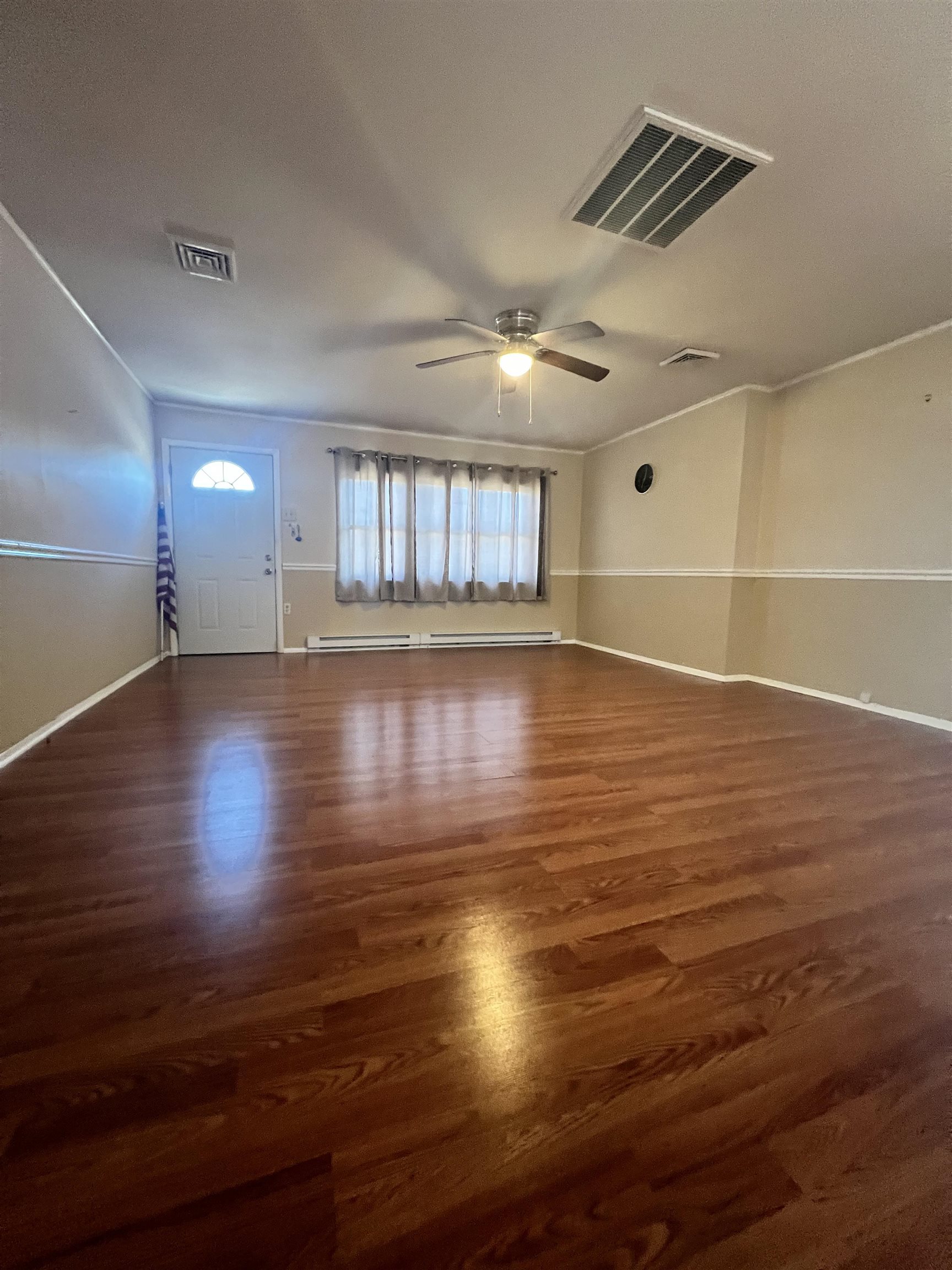 116 Kenvil Road North Cape May, NJ 08204 - Photo 3 of 16 a view of room and hall with wooden floor