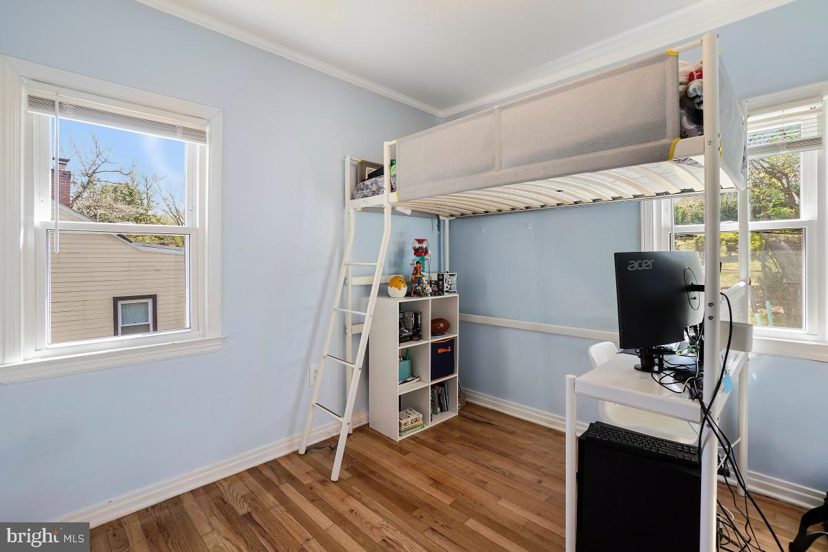 4206 Dahill Road Silver Spring, MD 20906 - Photo 12 of 33 a view of a kitchen with fridge and wooden floor