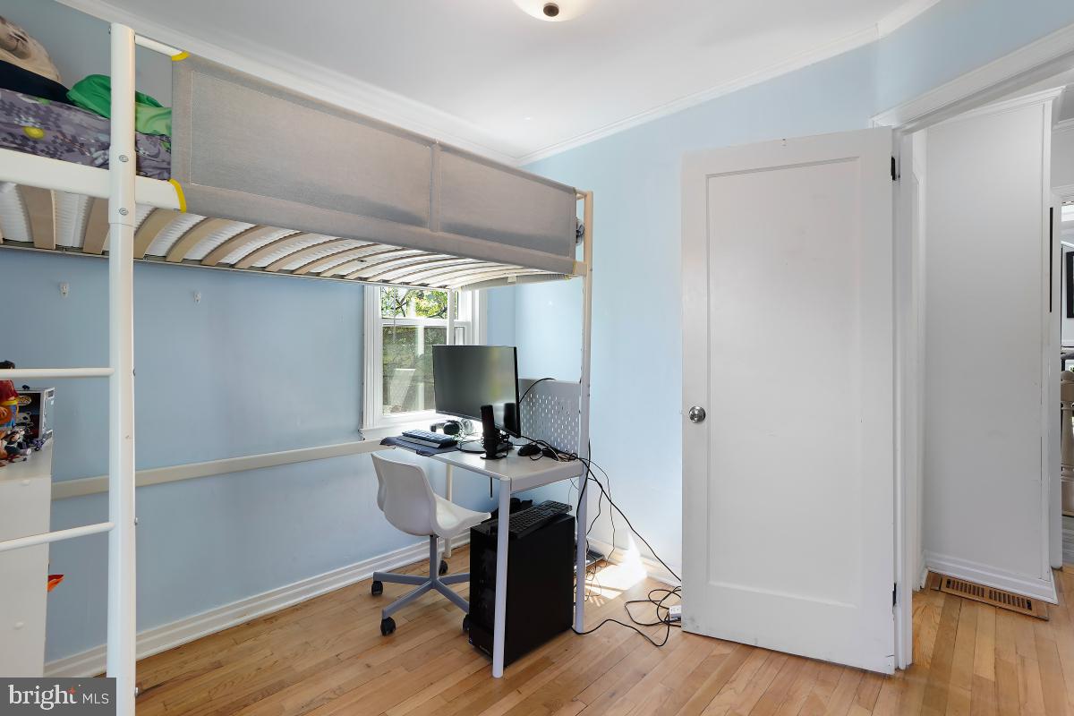 4206 Dahill Road Silver Spring, MD 20906 - Photo 13 of 33 a workspace with wooden floor and a window