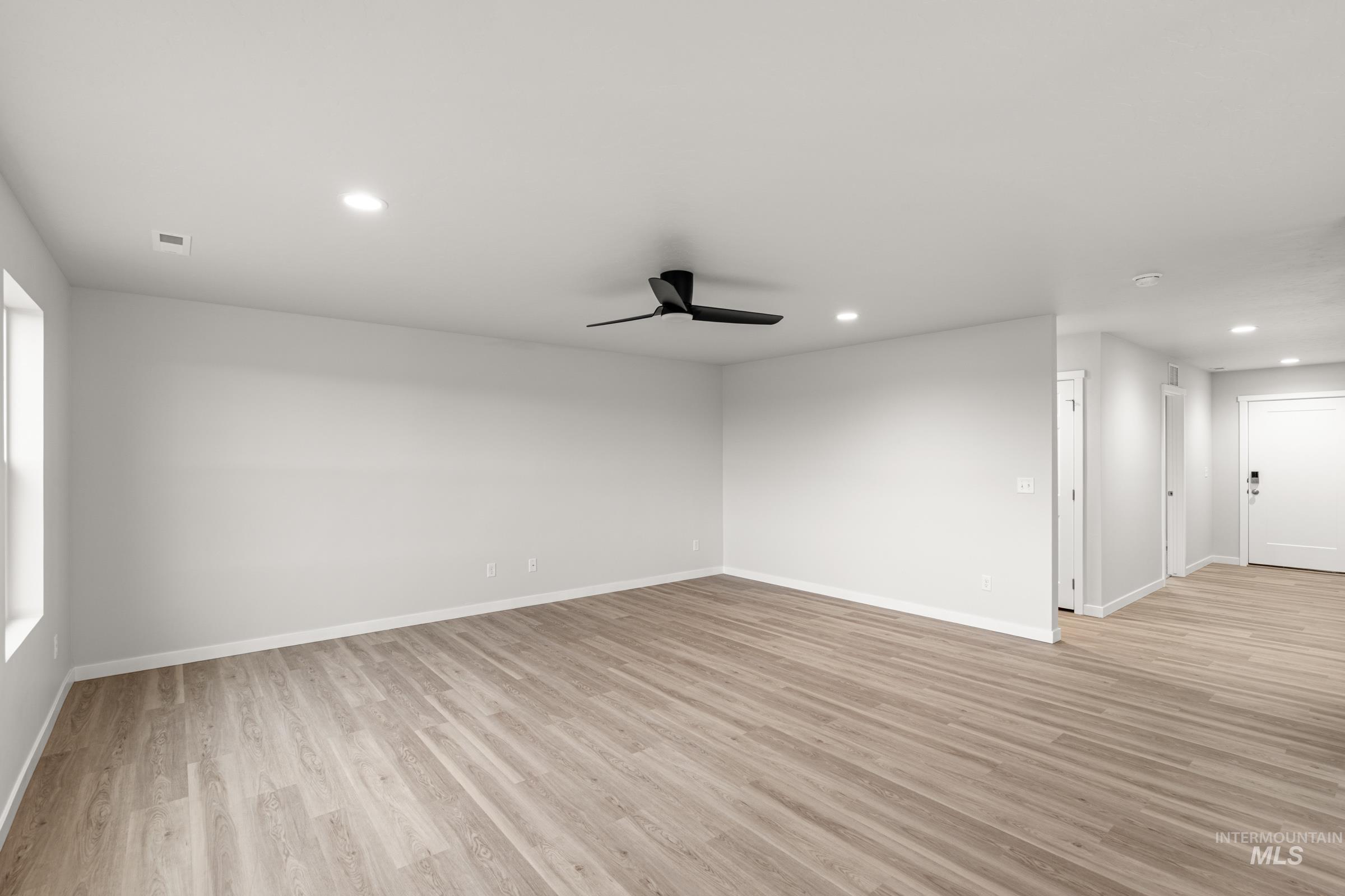 13693 Redway Court Caldwell, ID 83607 - Photo 8 of 25 Unfurnished room with recessed lighting, ceiling fan, and light wood-style floors