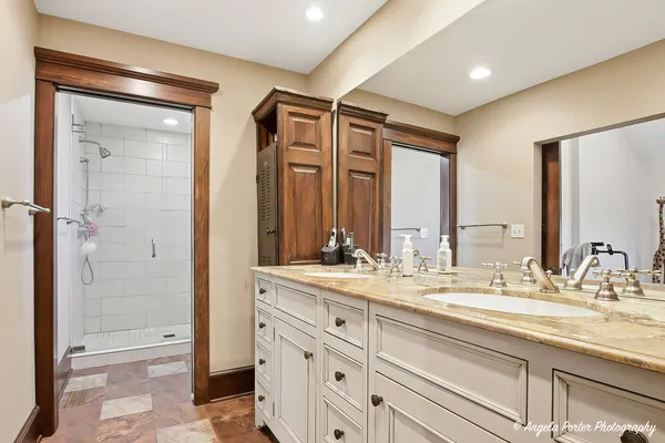 a bathroom with a shower and toilet