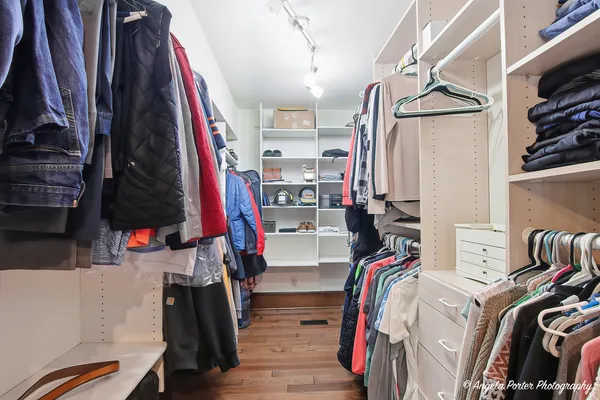 a bathroom with a toilet and a shower curtain