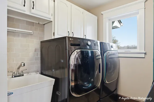 a view of livingroom with furniture and windows