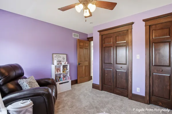 a bathroom with a sink a mirror and a shower