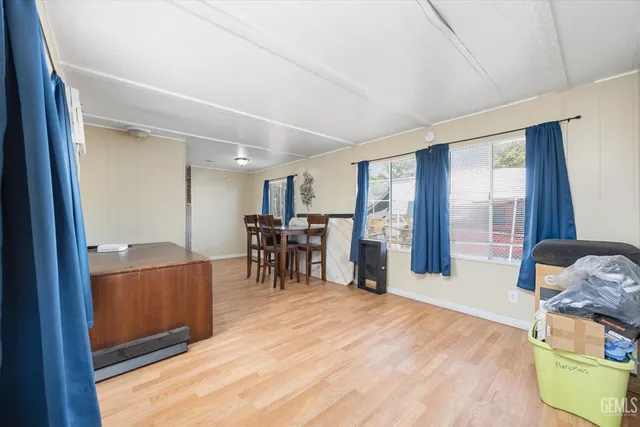 a room with furniture and wooden floor