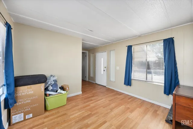 a view of an empty room and window