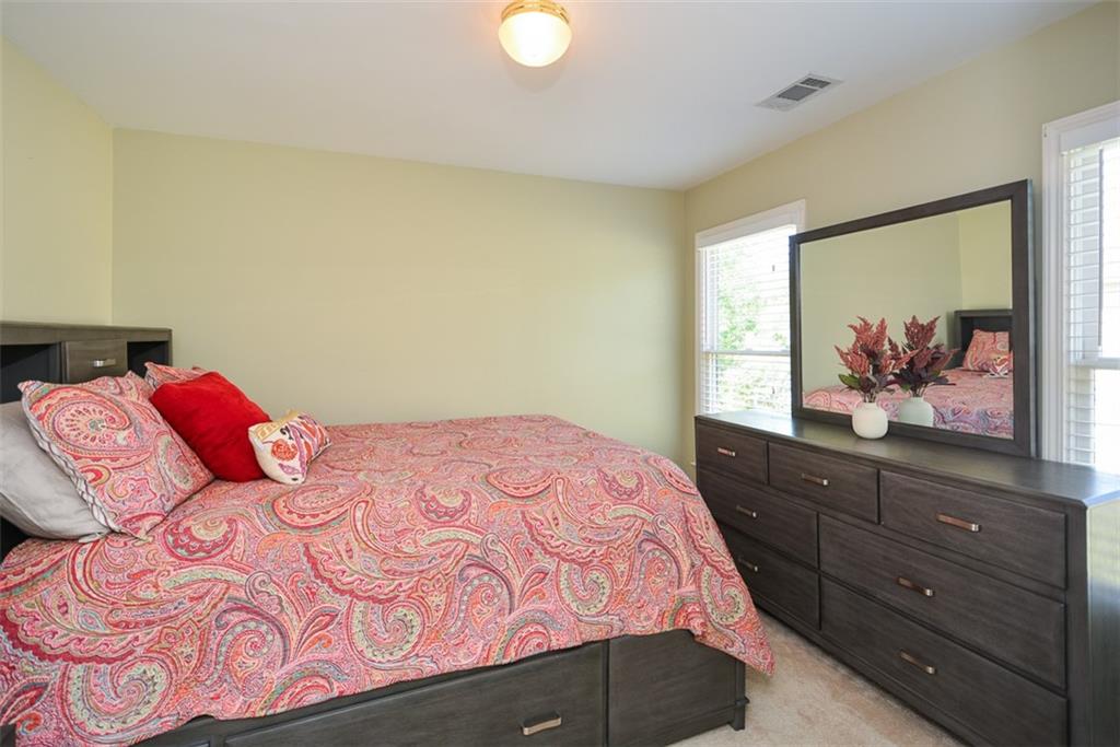 10 Arbor Hills Road South Talking Rock, GA 30175 - Photo 35 of 89 a bedroom with a bed and a dresser
