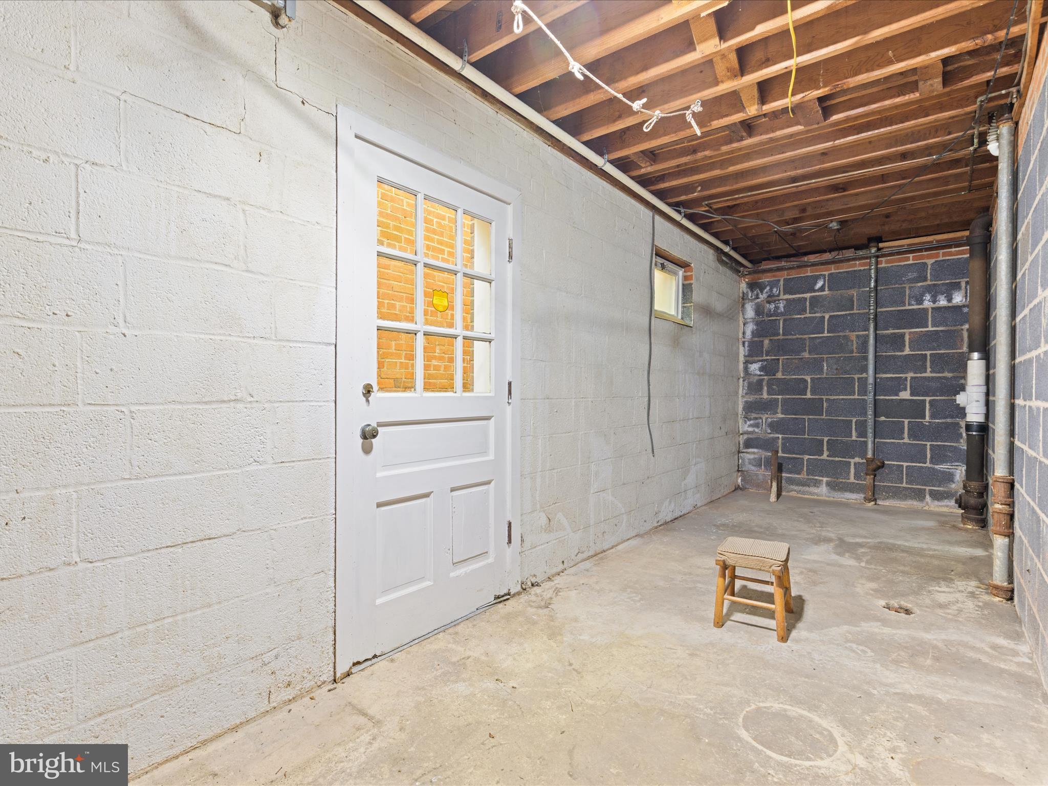9100 Stonewall Road Manassas, VA 20110 - Photo 30 of 62 Walk up Basement stairs + Storage