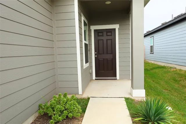 a view of entrance gate of the house