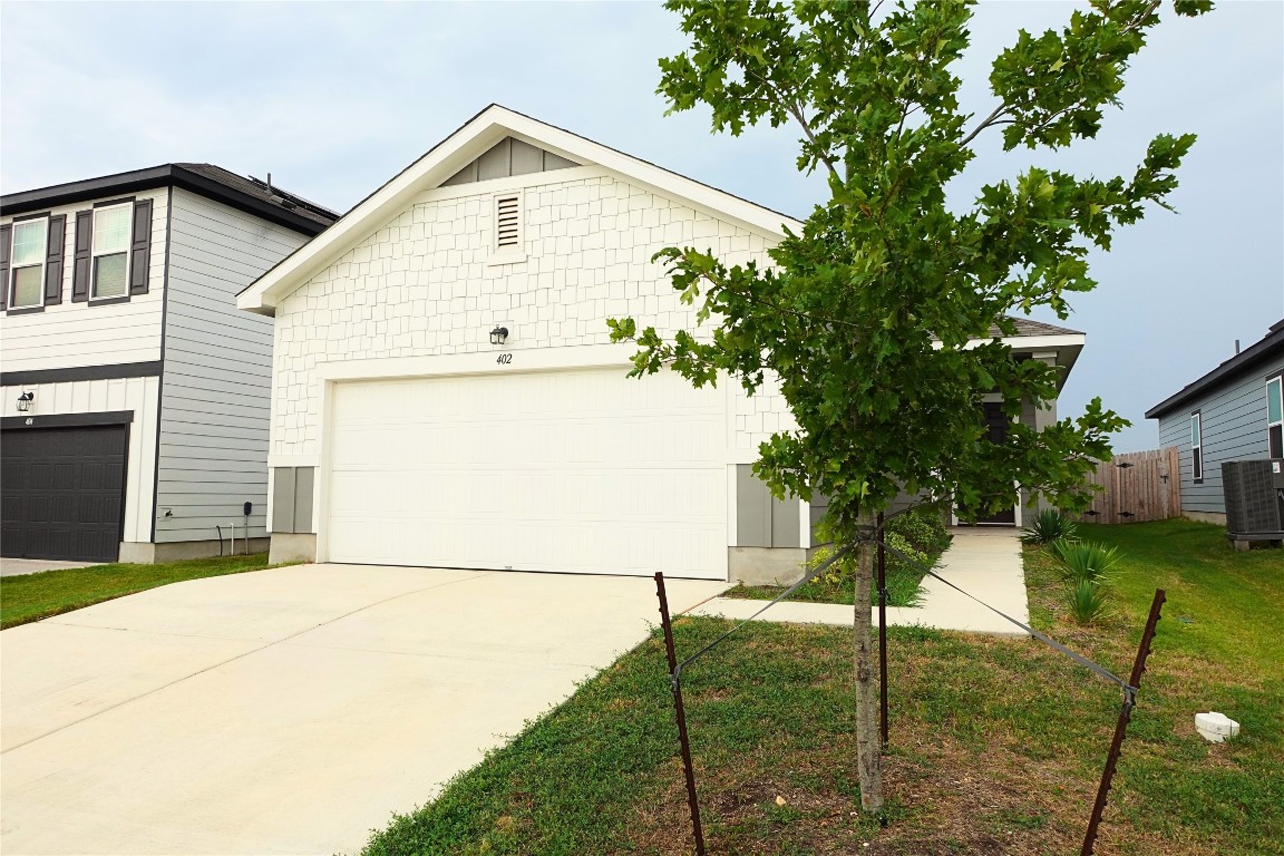 402 Plateau Street Maxwell, TX 78656 - Photo 2 of 18 a view of a house with a yard