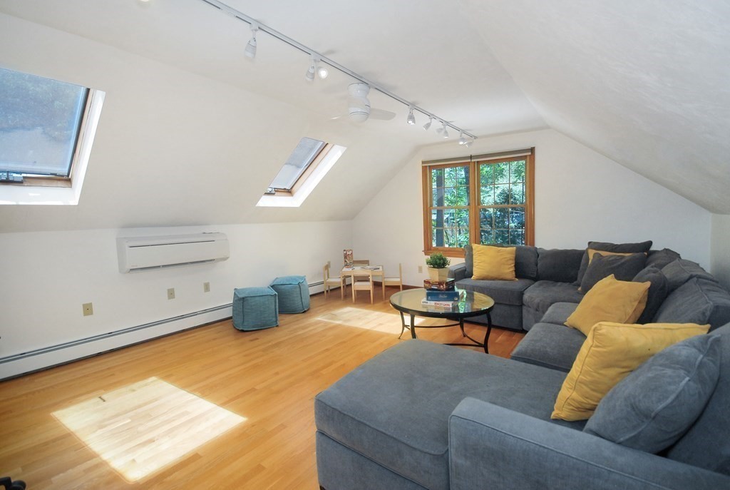 22 Taylor Road Stow, MA 01775 - Photo 15 of 32 a living room with furniture and a window