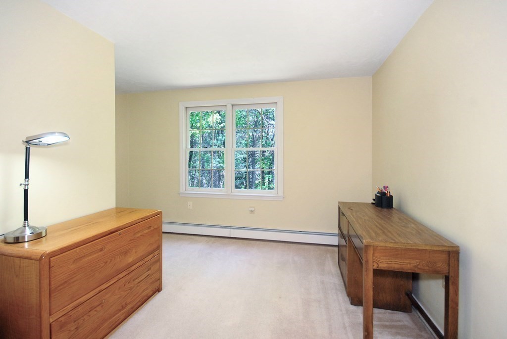 22 Taylor Road Stow, MA 01775 - Photo 20 of 32 a room with a table and a window