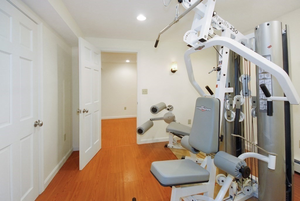 22 Taylor Road Stow, MA 01775 - Photo 22 of 32 a view of a livingroom with furniture and entryway