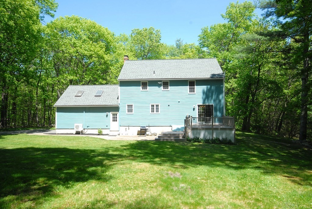 22 Taylor Road Stow, MA 01775 - Photo 31 of 32 an aerial view of a house with swimming pool and sitting area