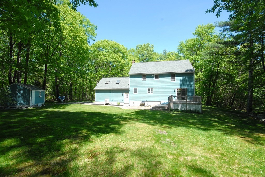 22 Taylor Road Stow, MA 01775 - Photo 32 of 32 a fire hydrant in the middle of a big yard