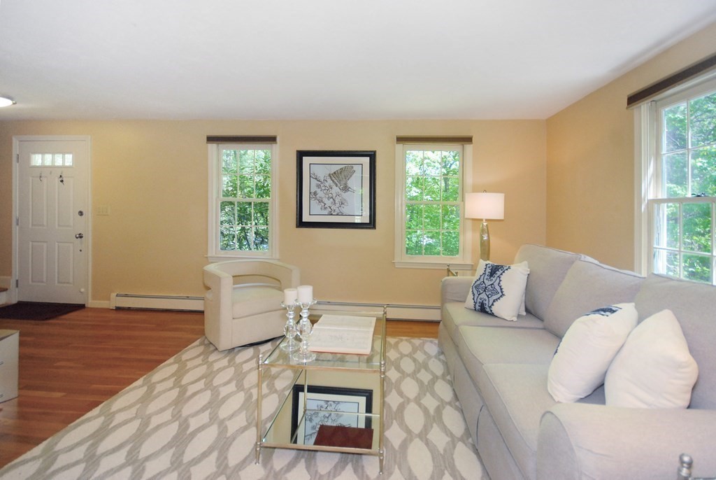 22 Taylor Road Stow, MA 01775 - Photo 4 of 32 a living room with furniture and a window