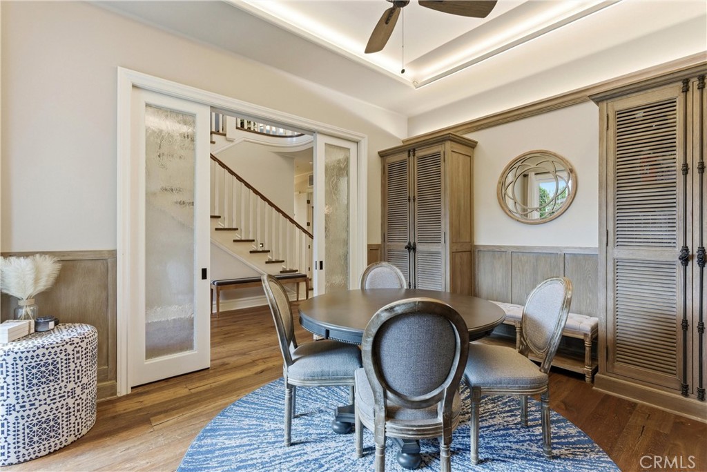 29131 Bouquet Canyon Road Silverado, CA 92676 - Photo 13 of 74 a dining room with furniture a rug and wooden floor