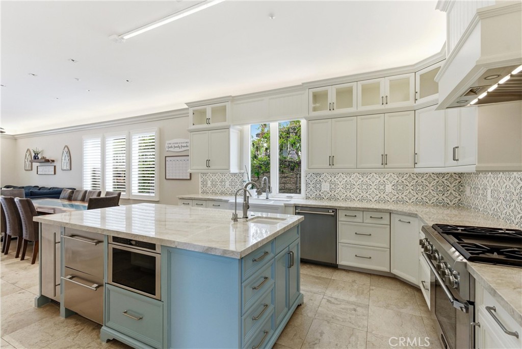 29131 Bouquet Canyon Road Silverado, CA 92676 - Photo 15 of 74 a kitchen with stainless steel appliances granite countertop a stove and cabinets
