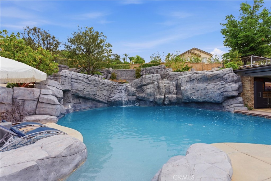29131 Bouquet Canyon Road Silverado, CA 92676 - Photo 27 of 74 a view of a swimming pool with a patio