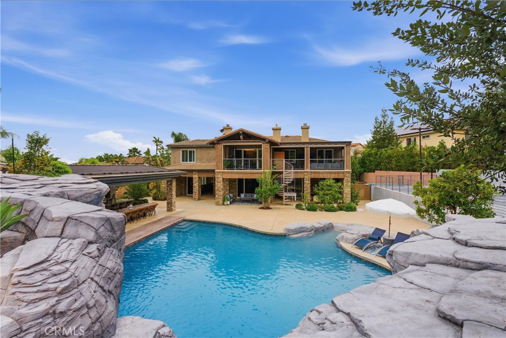 29131 Bouquet Canyon Road Silverado, CA 92676 - Photo 28 of 74 a view of a house with pool and chairs