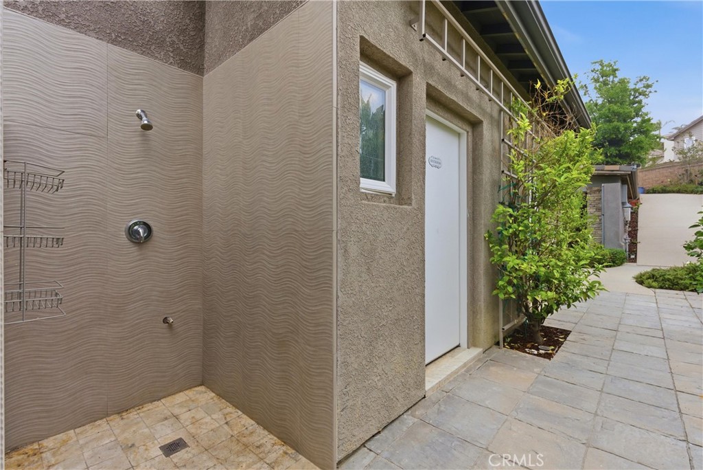 29131 Bouquet Canyon Road Silverado, CA 92676 - Photo 34 of 74 Outdoor shower and pool bathroom access from backyard