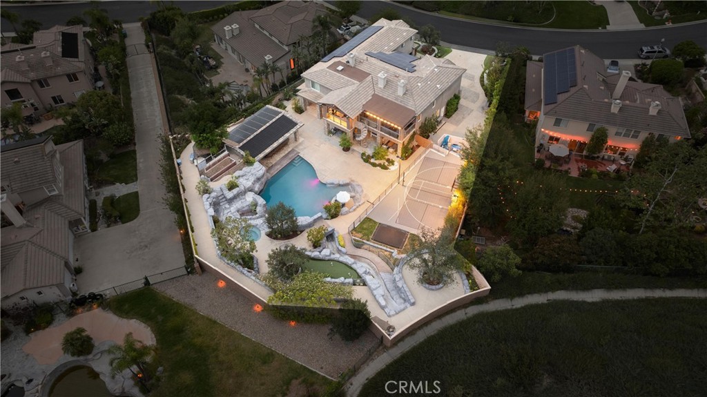 29131 Bouquet Canyon Road Silverado, CA 92676 - Photo 4 of 74 Aerial backyard view showing pool, outdoor kitchen and sports court