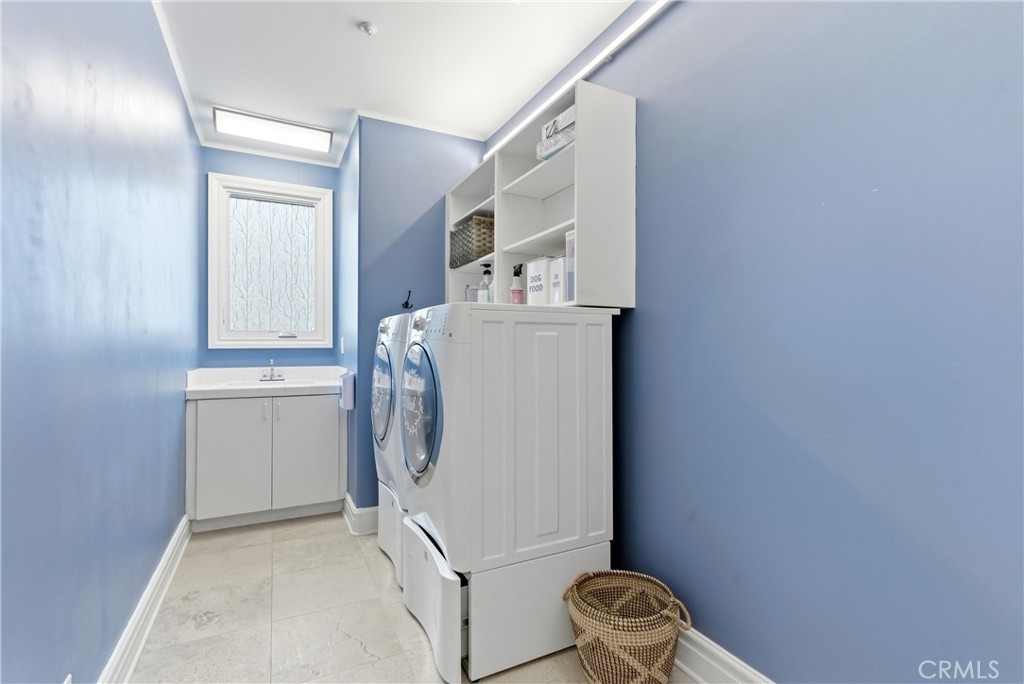 29131 Bouquet Canyon Road Silverado, CA 92676 - Photo 41 of 74 a utility room with dryer and washer