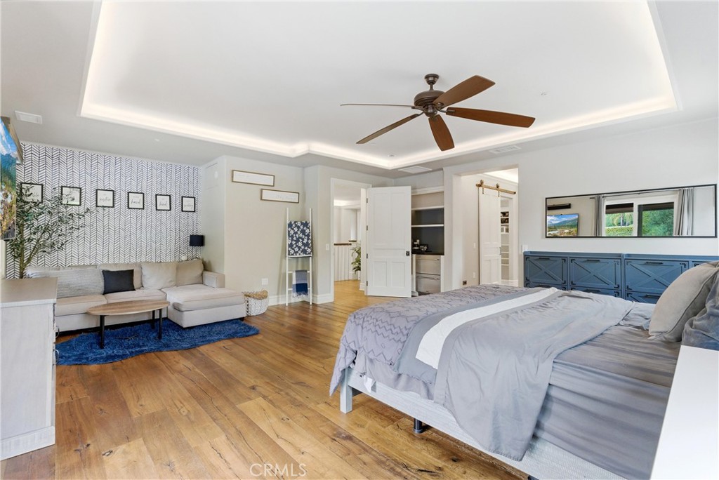 29131 Bouquet Canyon Road Silverado, CA 92676 - Photo 46 of 74 a bedroom with a bed couch and window