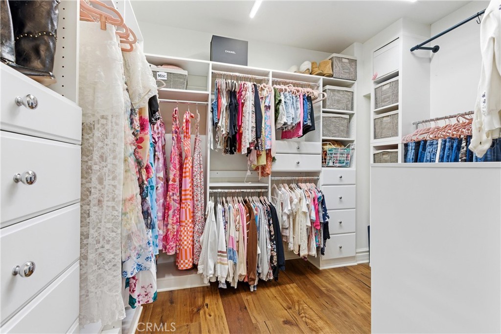 29131 Bouquet Canyon Road Silverado, CA 92676 - Photo 49 of 74 a view of walk in closet with clothes