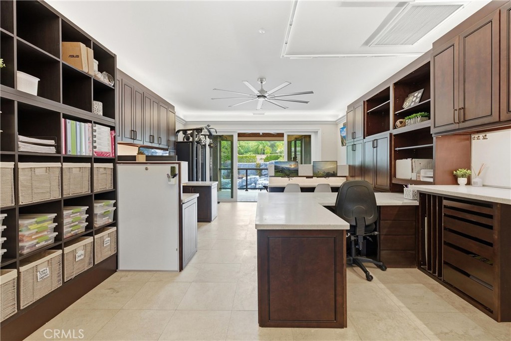 29131 Bouquet Canyon Road Silverado, CA 92676 - Photo 56 of 74 Large office with built in storage and craft table