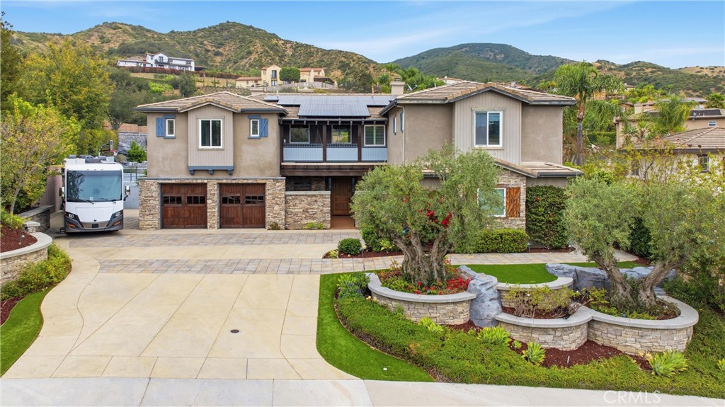 29131 Bouquet Canyon Road Silverado, CA 92676 - Photo 67 of 74 a front view of a house with a yard and lake view