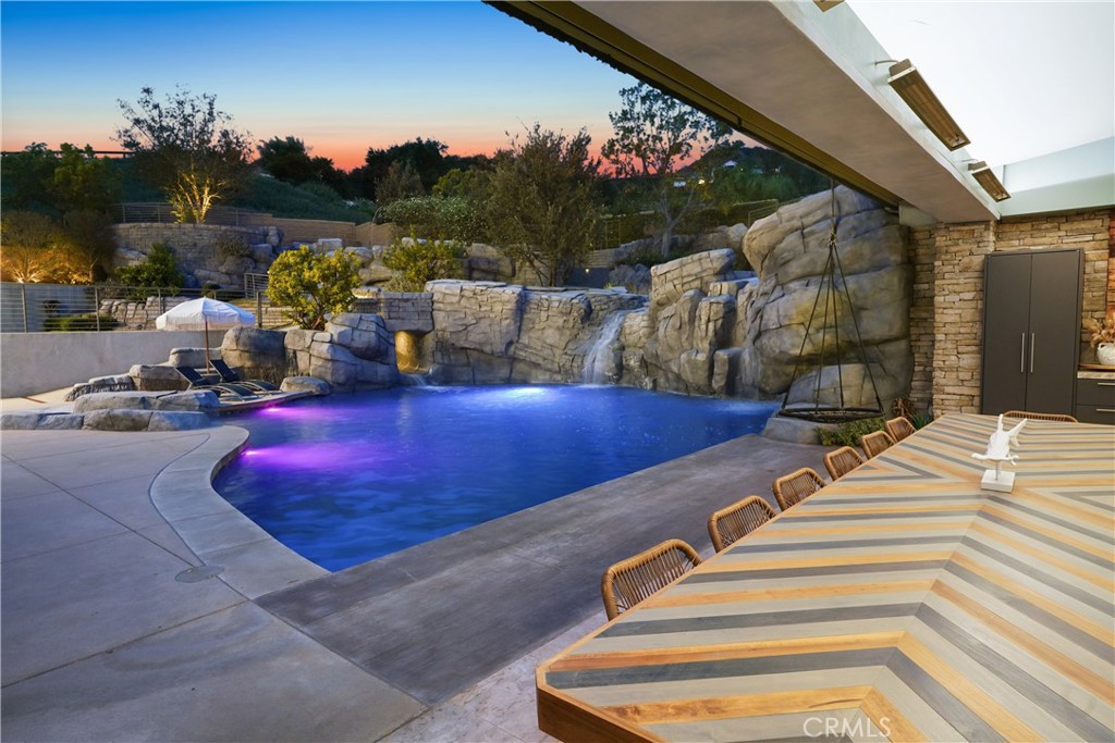 29131 Bouquet Canyon Road Silverado, CA 92676 - Photo 9 of 74 a view of a patio with swimming pool