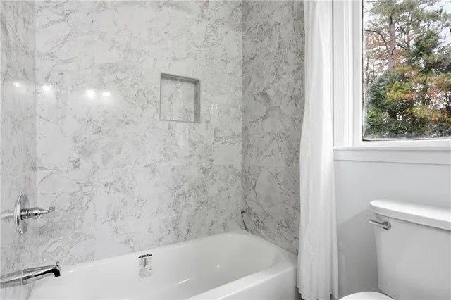 a bathroom with a bathtub