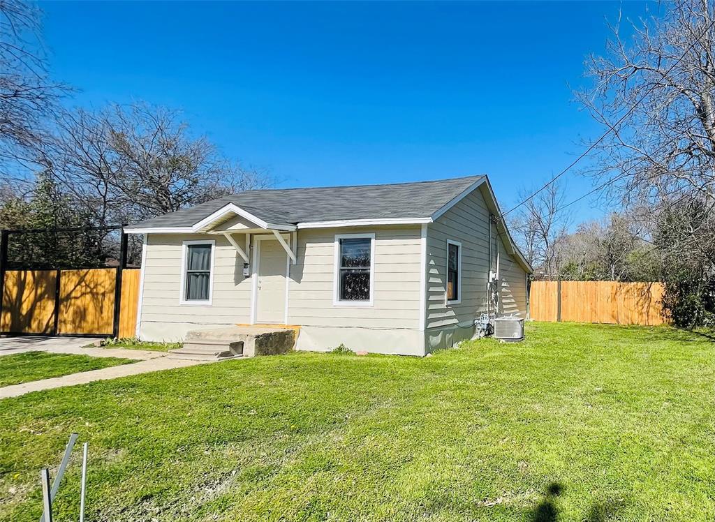 111 Rousseau Street Waxahachie, TX 75165 - Photo 2 of 22 a view of a house with a yard and sitting area