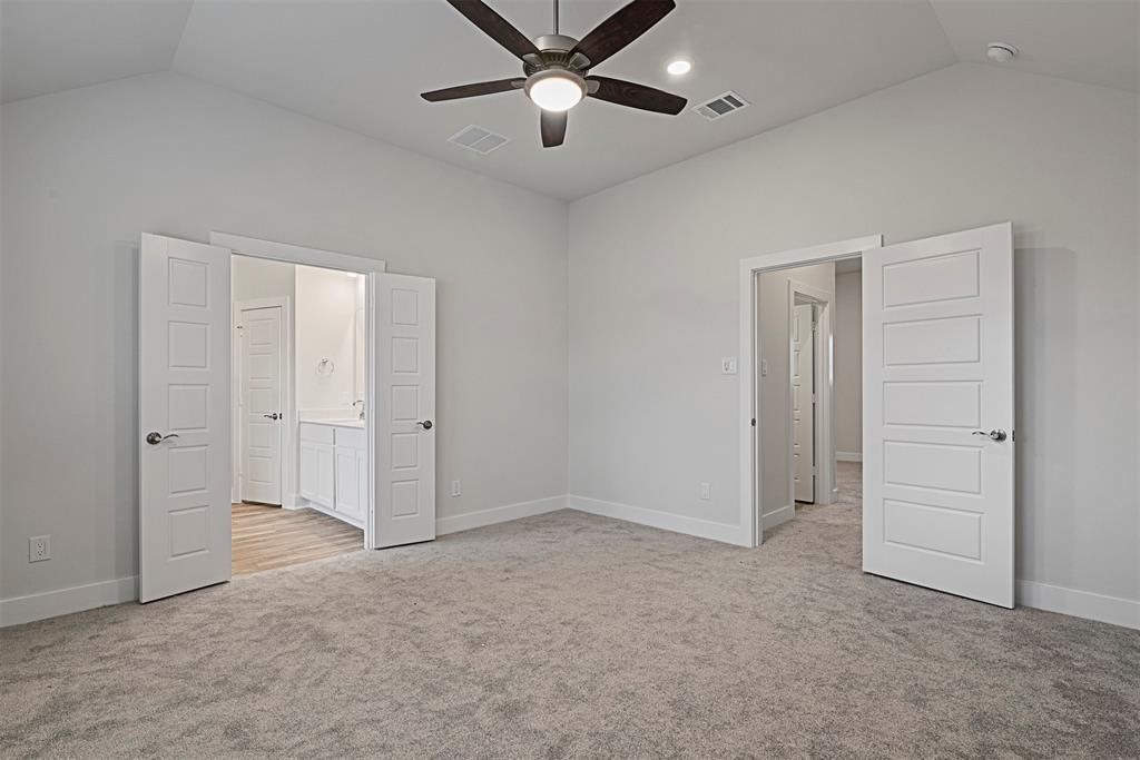 10638 Whitejacket Conroe, TX 77385 - Photo 16 of 25 an empty room with closet and windows