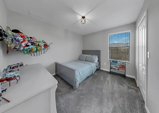 a view of houses with an outdoor space and lakeside