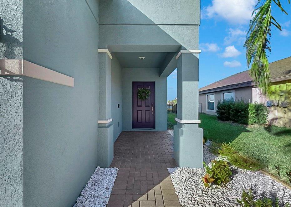 10136 Newminster Loop Ruskin, FL 33573 - Photo 26 of 64 a view of a entrance