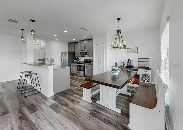 a living room with furniture and window