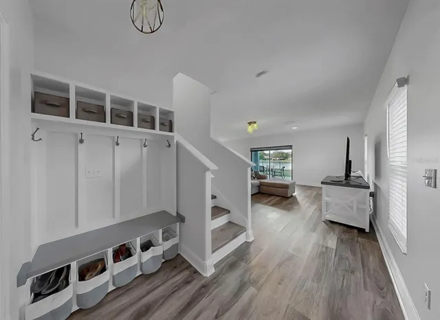 a spacious bedroom with a bed and a window