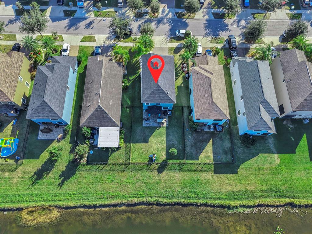10136 Newminster Loop Ruskin, FL 33573 - Photo 60 of 64 an aerial view of houses and roads